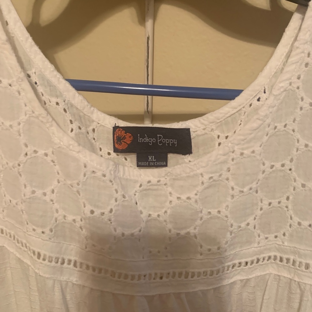 Sleeveless white top